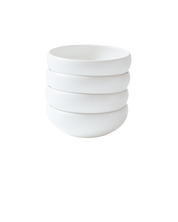 A set of four Medium Goun Bowls in speckled moon-white ceramic, by Soilbaker for Material.