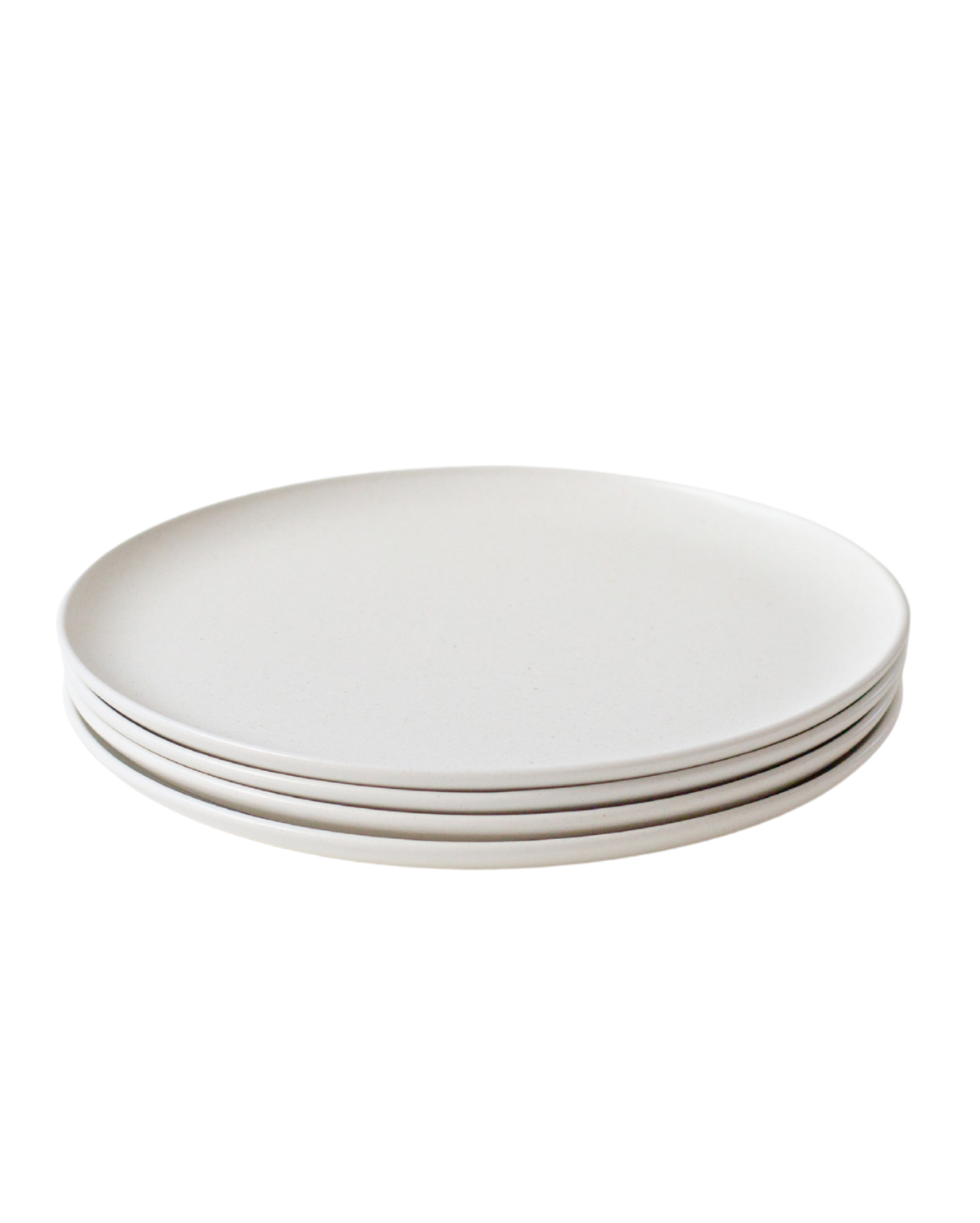 A set of four Goun Plates in speckled moon-white ceramic, by Soilbaker for Material.
