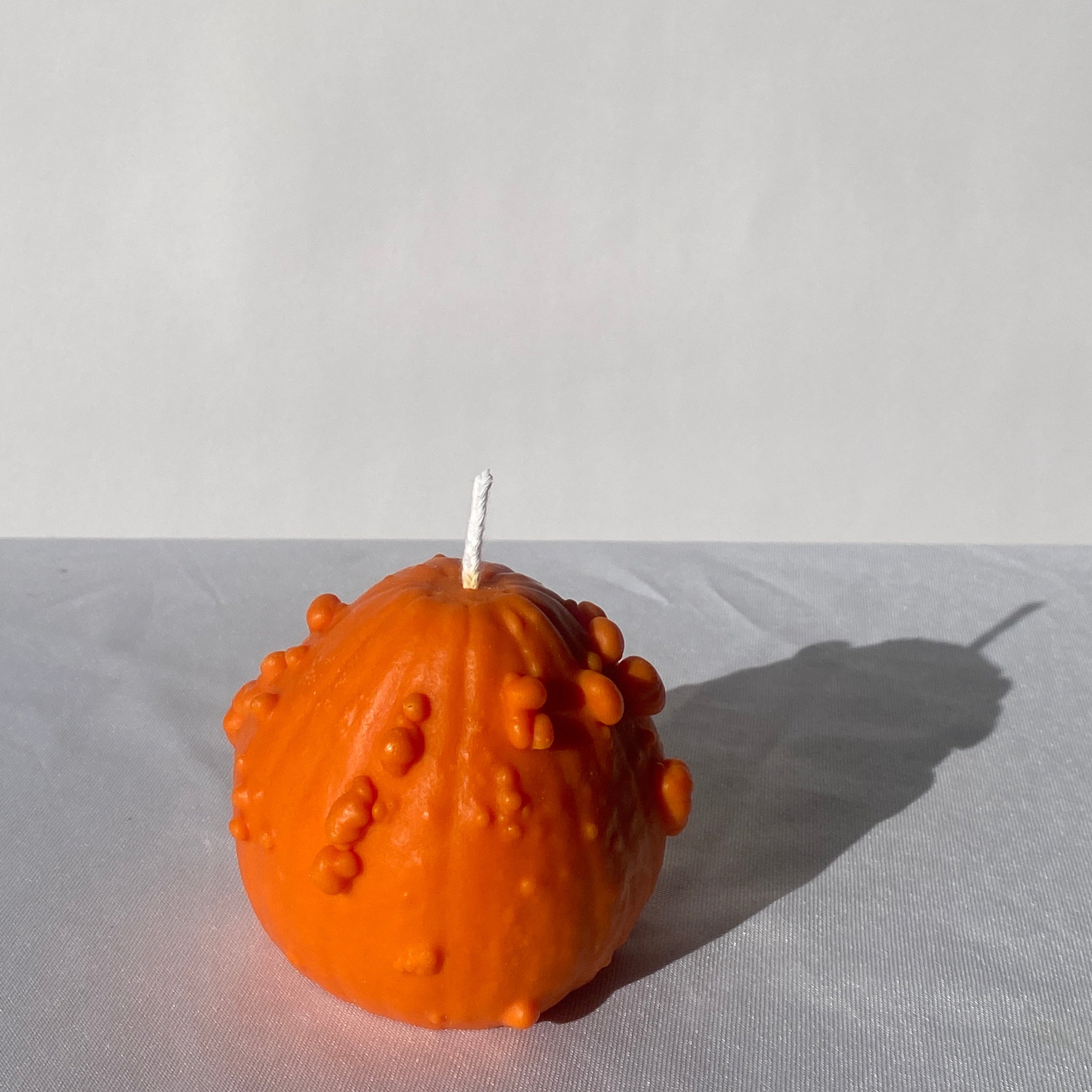 Knucklehead Candle | Orange - pretti.cool