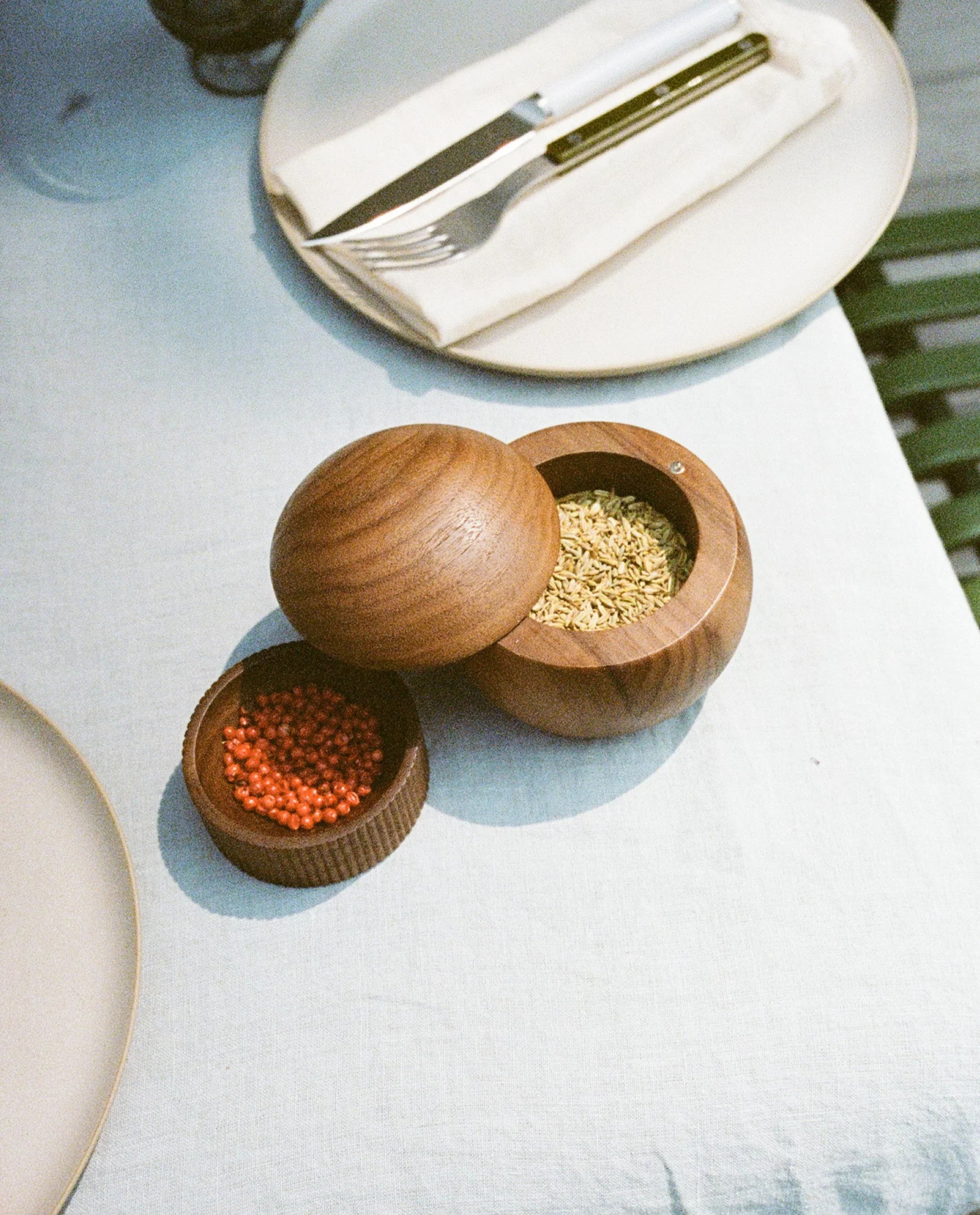 The Salt Sphere wooden salt cellar from Material, styled on the counter.