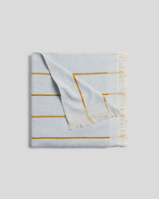 Bayside Beach Towel in Lagoon with Marigold by Parachute Home — view 1