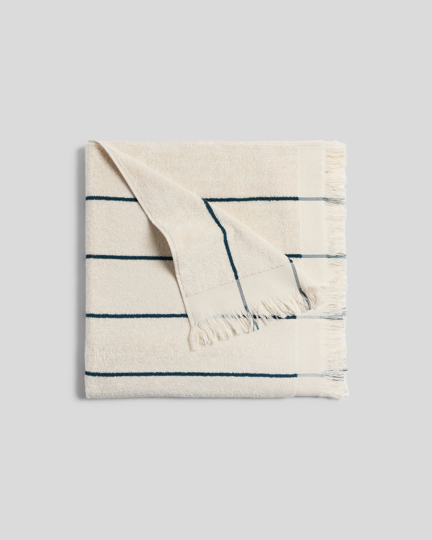 Bayside Beach Towel in Natural with Peacock by Parachute Home — view 1