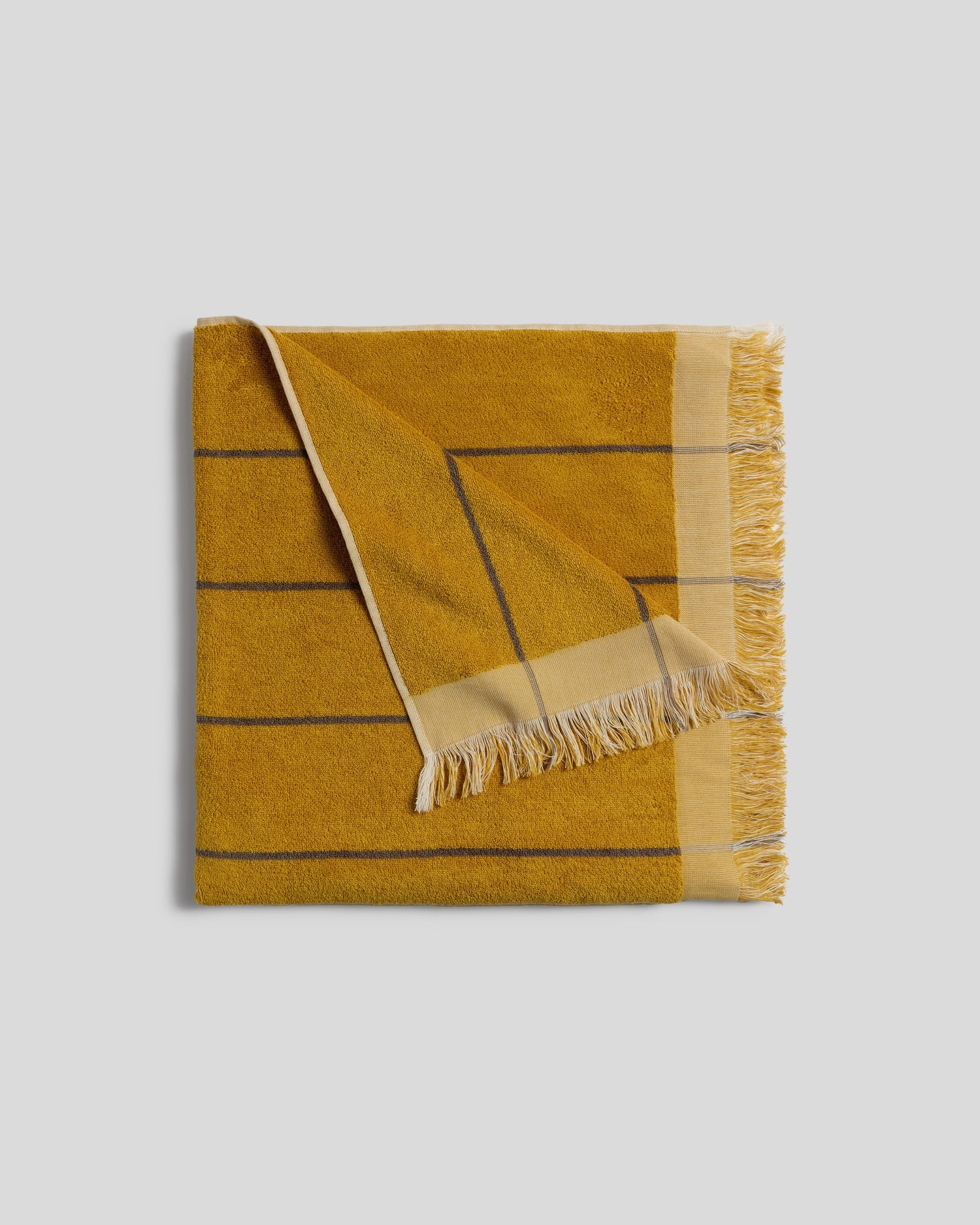 Bayside Beach Towel in Marigold with Warm Grey by Parachute Home — view 1