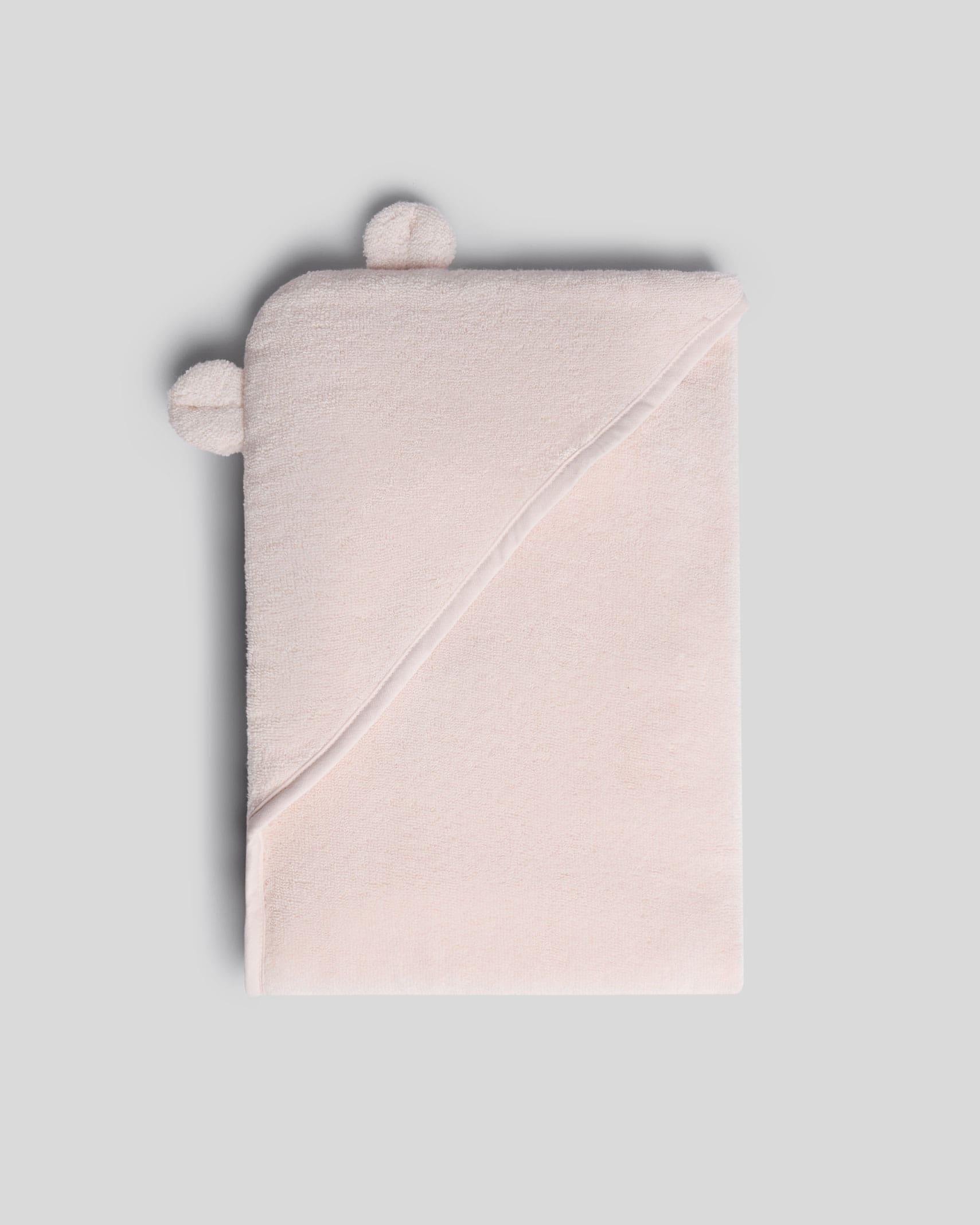 Organic Hooded Baby Towel with Ears in Blush by Parachute Home — view 1
