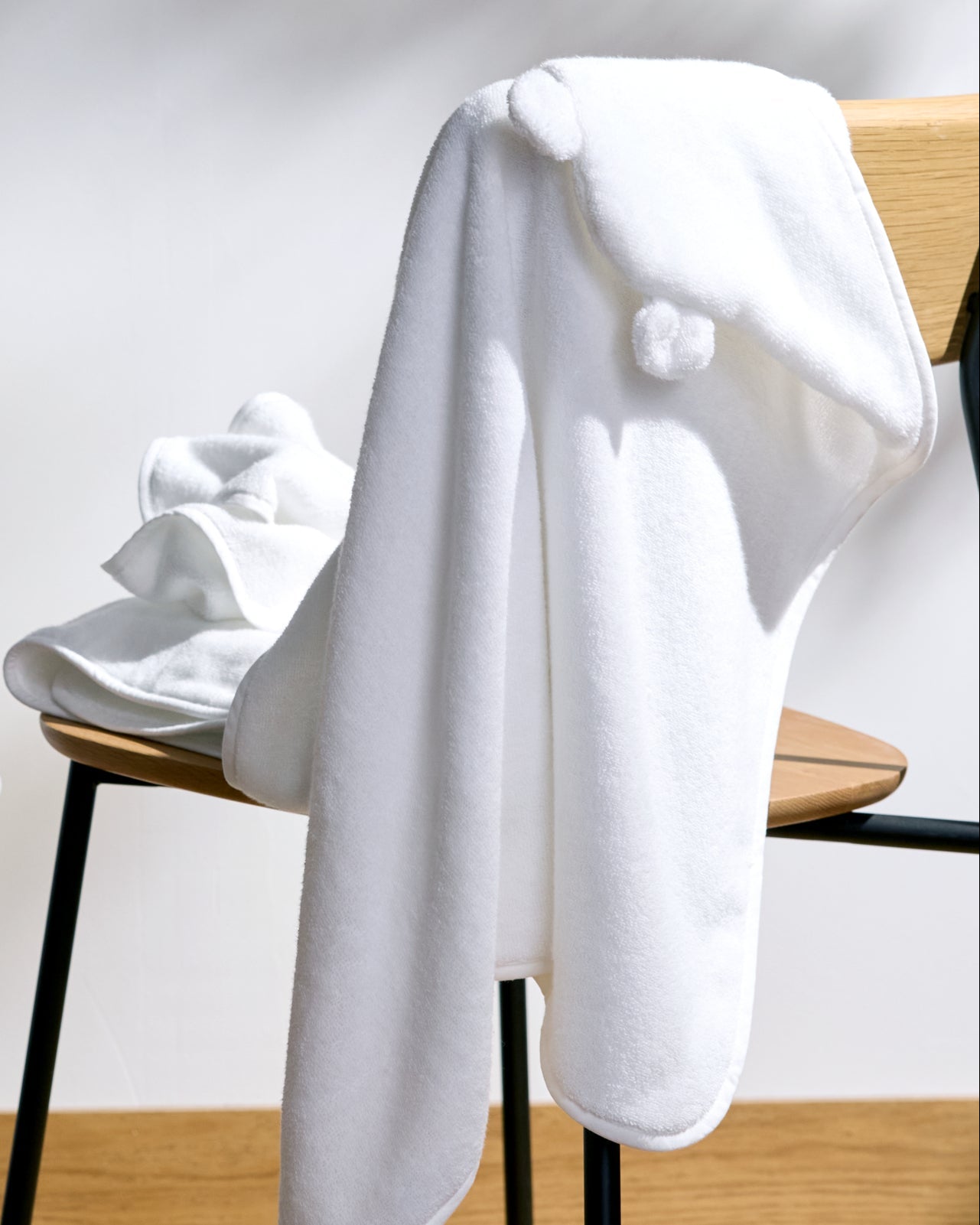 Organic Hooded Baby Towel with Ears in White by Parachute Home — view 3