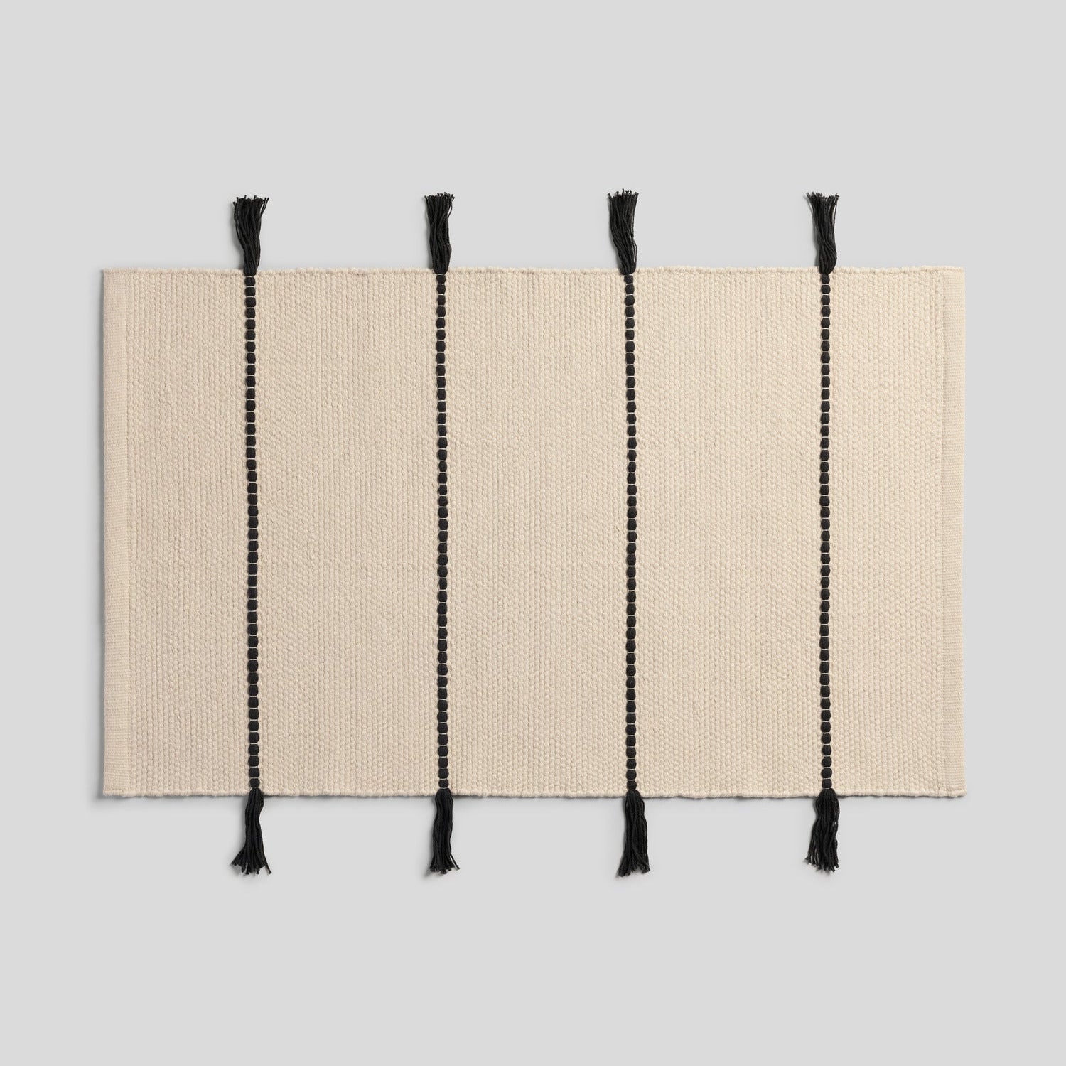 Organic Tassel Bath Rug in Natural and Onyx by Parachute Home — view 1