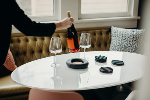 Wine pour with concrete trivet