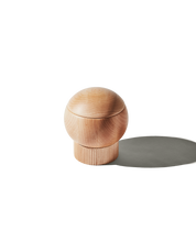 The Salt Sphere salt cellar in Maple wood, from Material — magnetic swivel lid and fluted stackable base.